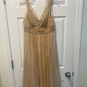 Floor length gold beaded gown